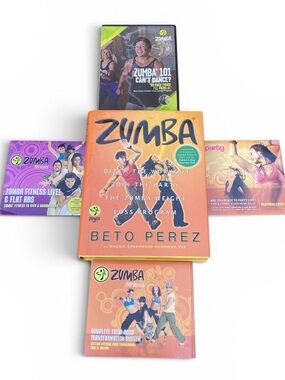 7 ZUMBA DVDS + Zumba Book